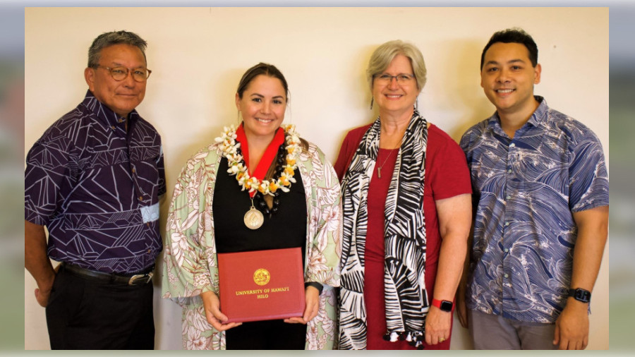 Congratulating Method (second from left) at the awards program were UH Regent Wayne Higaki, UH Hilo Chancellor Bonnie Irwin and Dr. Jarred Prudencio, nominator.