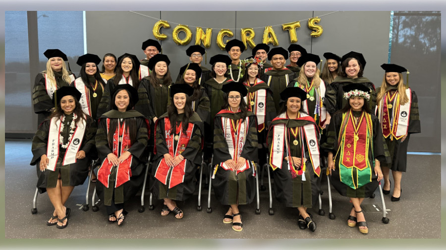 Members of the Class of 2024 pose together the night before graduation.